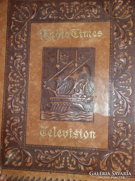 A leather folder laced along the relief side of an antique ship for 3 documents as shown in the pictures