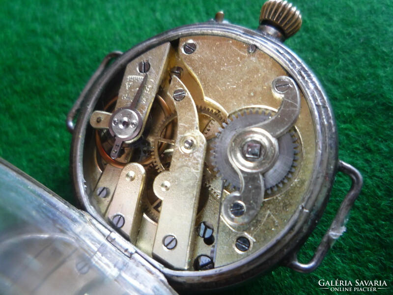 Old silver watch.