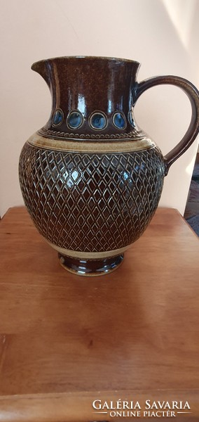 A wonderful ceramic peacock eye jug