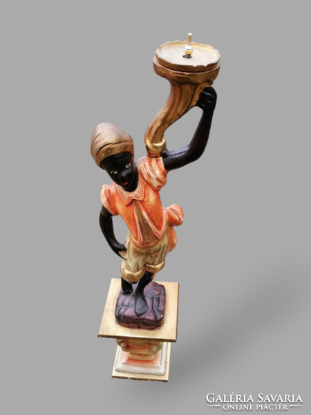 Wooden sculpture candle holder African man