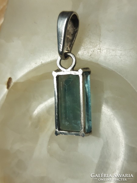 Old silver pendant with topaz stones