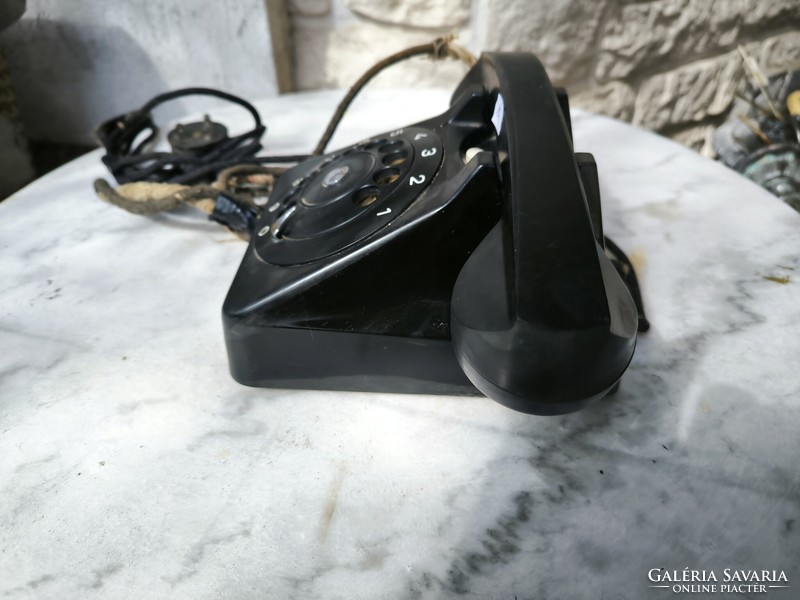 Bakelite telephone, old type with dial. (Hungarian Post)
