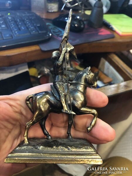 Equestrian statue made of copper alloy, 14 cm in size.