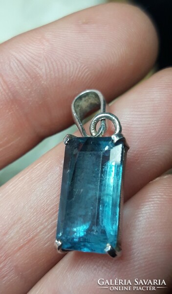 Old silver pendant with topaz stones