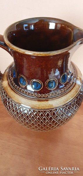 A wonderful ceramic peacock eye jug