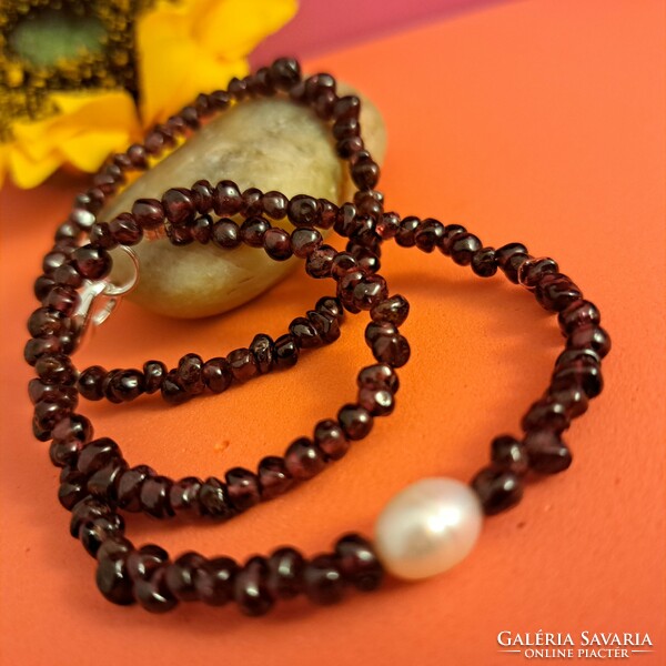 Garnet and real pearl necklaces, modern elegance.