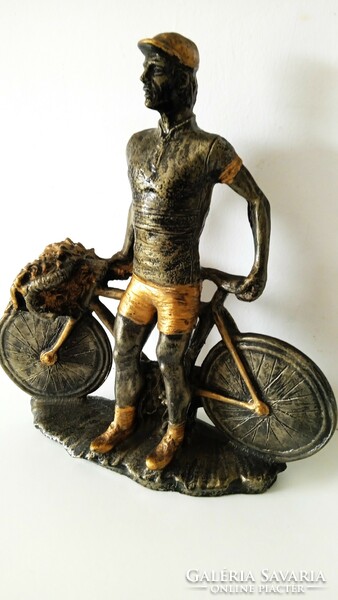 Vintage bronzed resin statue of Hubert Opperman