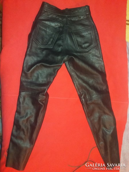 Quality black original thick leather motorcycle pants with laces on the side, in good condition as shown in the pictures