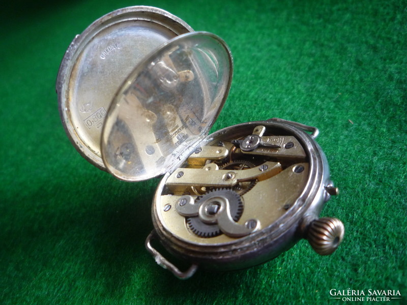 Old silver watch.