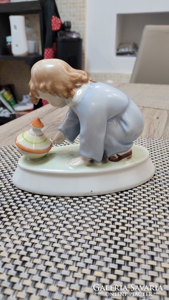 Zsolnay porcelain figure. Child with a snail.