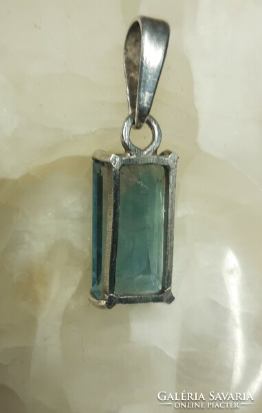 Old silver pendant with topaz stones