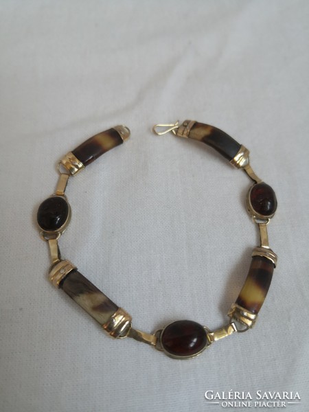 14K gold bracelet with tortoise shell inlay.