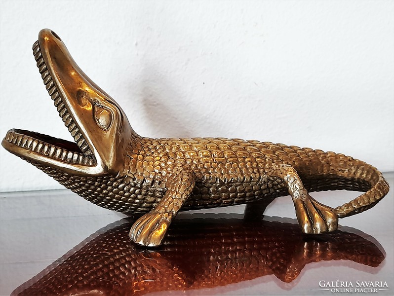 Old copper crocodile figurine