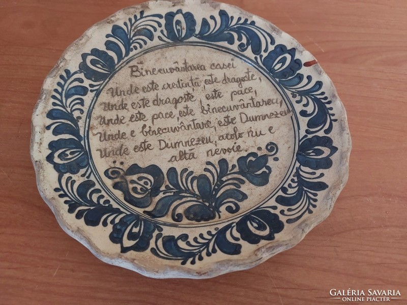 Old wall plate with a homemade blessing in Romanian