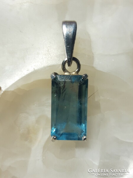 Old silver pendant with topaz stones