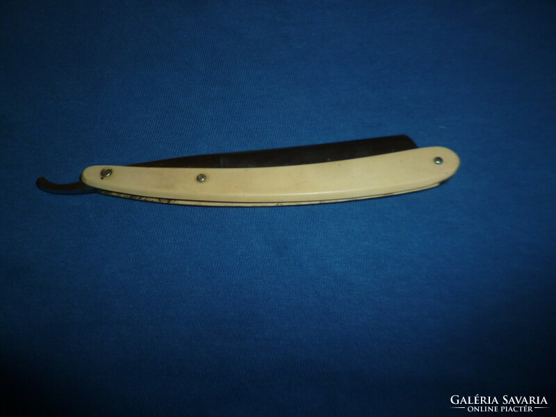 Antique solingen razor with handle