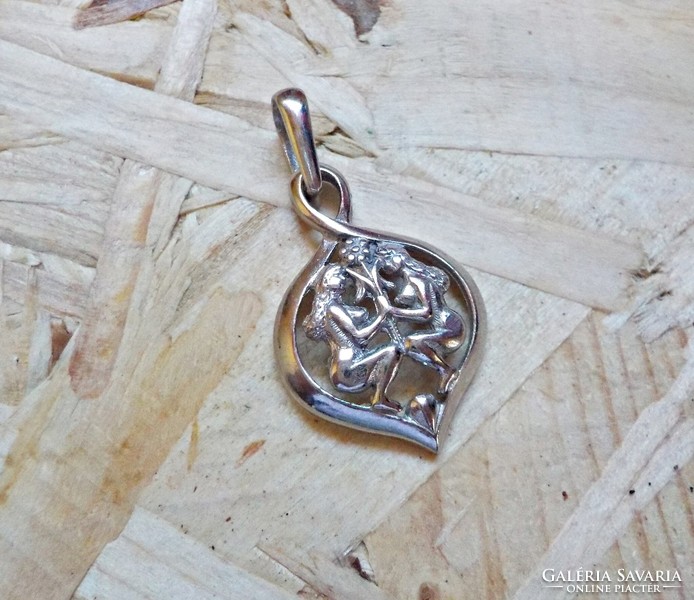 Old twins silver pendant