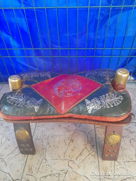 Antique: leather sitting knife, cushioned camel leg