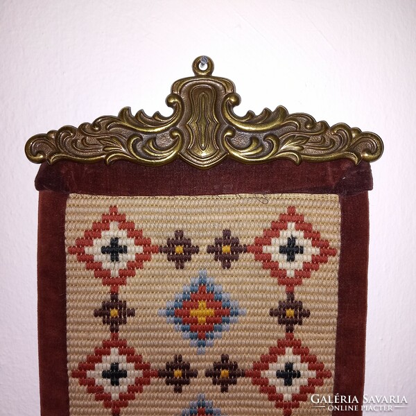 Servant bell stem with tapestry pattern. Wall decoration