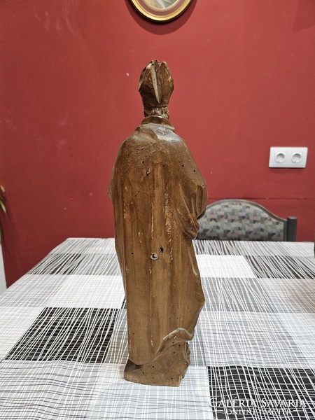 Antique carved statue of Saint Nicholas