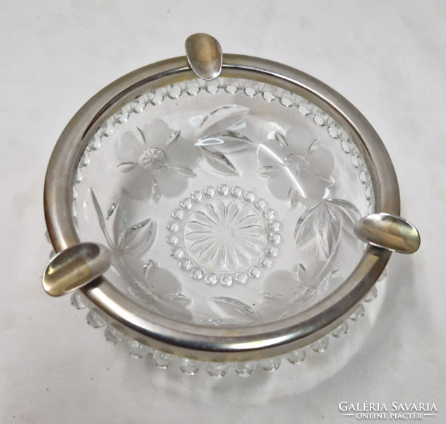 Old, metal-rimmed, polished, crystal ashtray in perfect condition