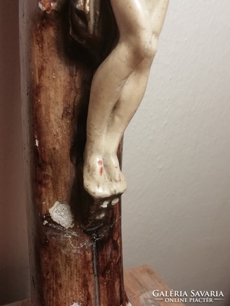 Old painted plaster cross, crucifix