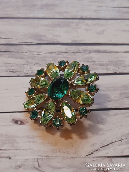 Brooch with green rhinestones