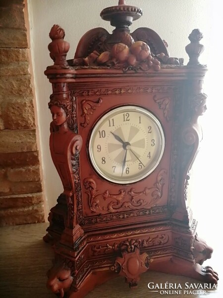Beautifully detailed wooden fireplace clock in the shape of a female lion