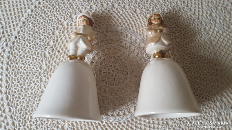 Old English style porcelain bell with a child's figure, in its box