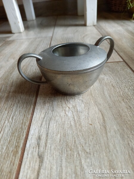 Old tin pourer and sugar bowl