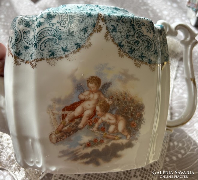Angelic porcelain tea pot with putty