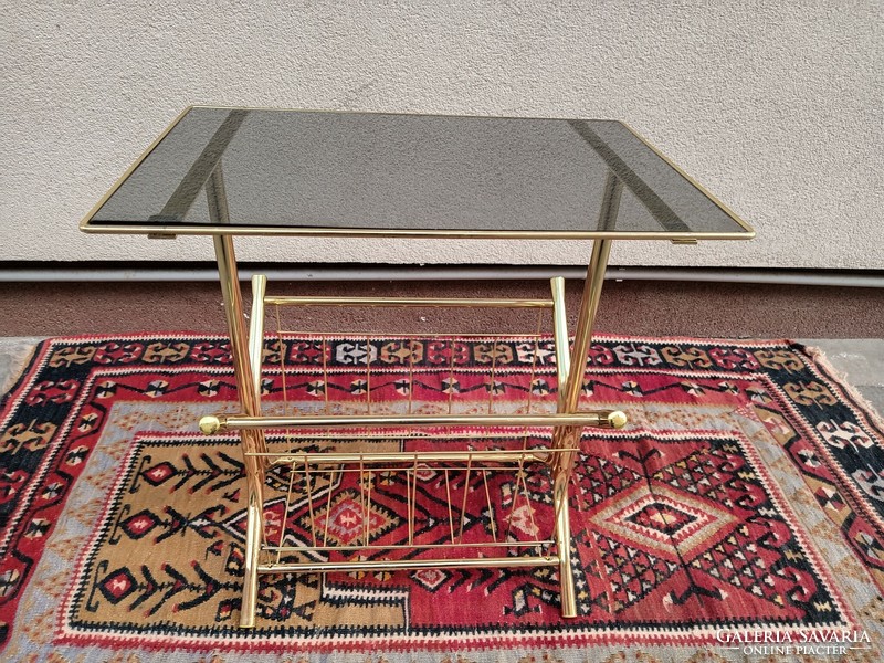 Hollywood regency copper newspaper holder table. Negotiable.