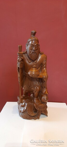 Indian wandering saint, hand-carved wooden sculpture. 38 cm high