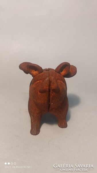 Antique old cast iron pig bush figure with wings, original patina in pristine condition