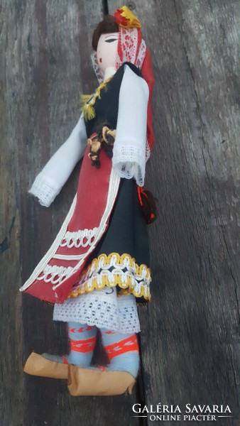 Old baby in traditional costume