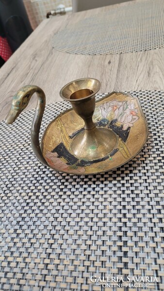 Copper swan walking candle holder.