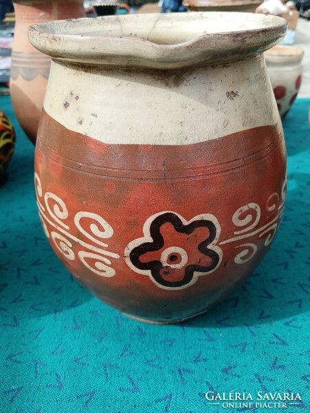 Large ceramic jug with floral pattern