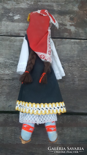 Old baby in traditional costume