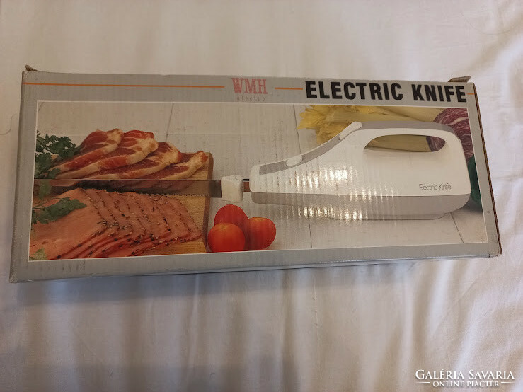 New electric knife in original packaging
