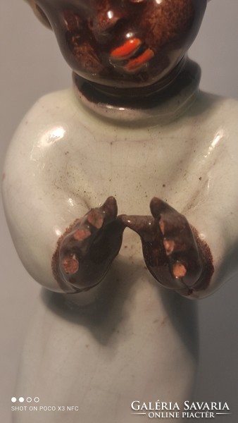 A rare Rahmer ceramic figure is damaged
