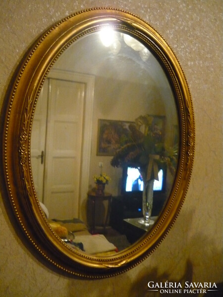 Mirror in blonde frame
