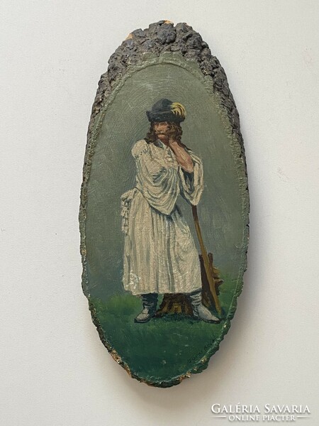 Béla Vörös's painting of a leaning outlaw is a full-length painting on an oval wooden sheet