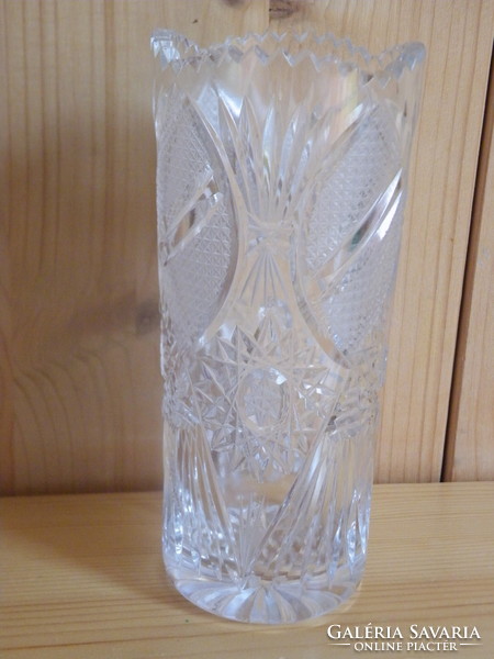 Old crystal vase with richly polished pattern