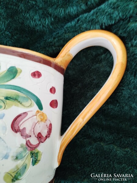 Handmade, ceramic watering can - in a rural atmosphere