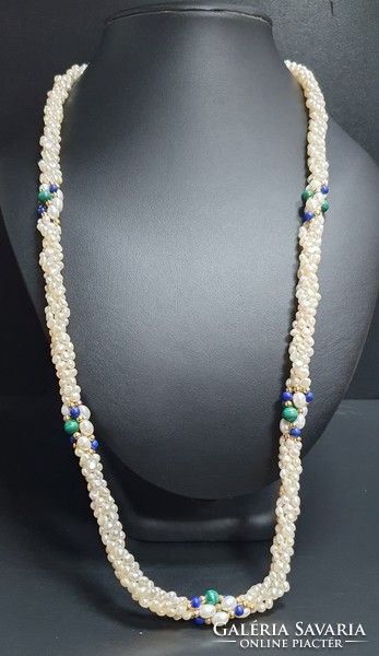 Remarkable baroque 4-row string of pearls with malachite and lapis lazuli decoration. With certification.