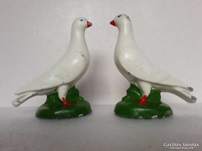 Pair of antique painted metal doves