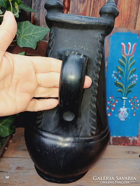 Black earthenware folk candle dipping vessel