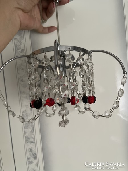 A very nice little crystal chandelier.