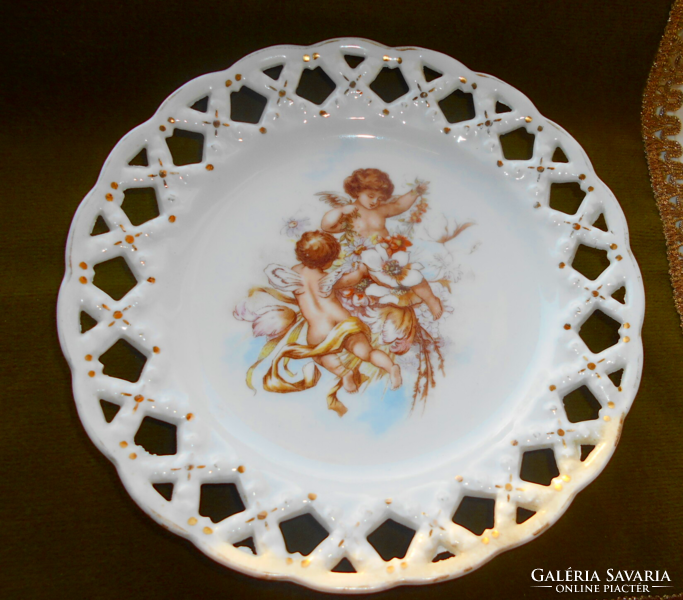 Antique Austrian plate with putts with an openwork border, 18.5 cm