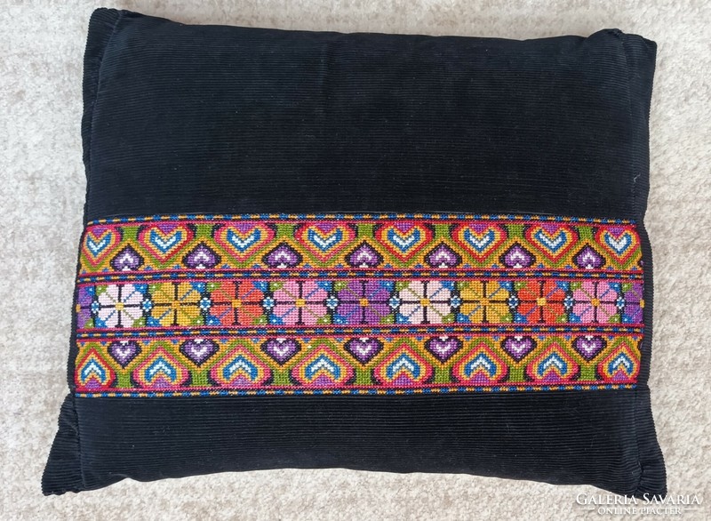 Pillow with old cross-stitch decoration